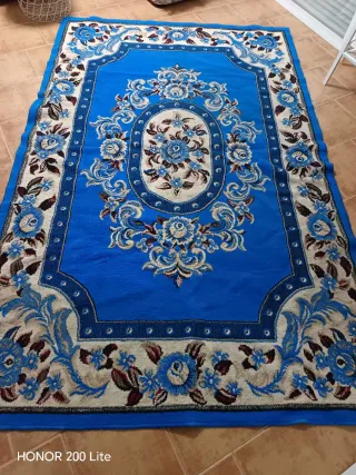 Alfombra antigua floral azul y beige