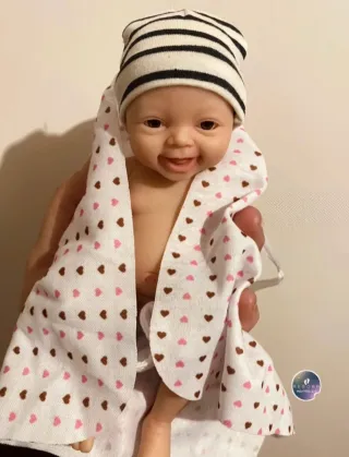 Muñeco de silicona flexible baby born