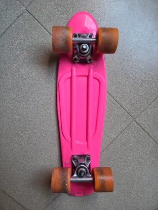 Monopatín rosa