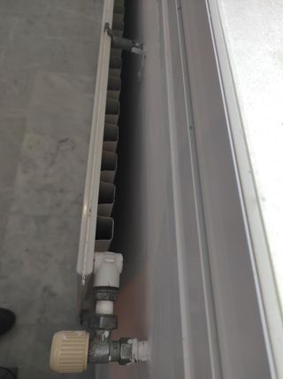 11 Radiadores de calefacción central y caldera