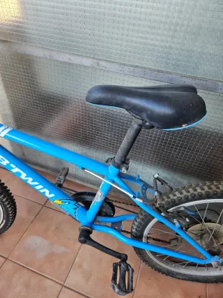 Bicicleta azul B'TWIN Racing Boy 320