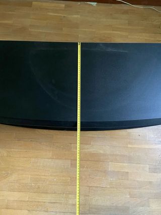 Mueble TV negro curvo con baldas