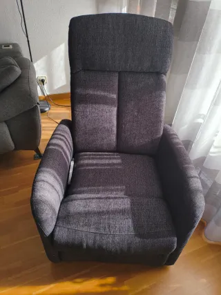 Sillón reclinable de tela gris
