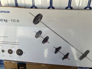 Banco de pesas Domyos + Barra y discos