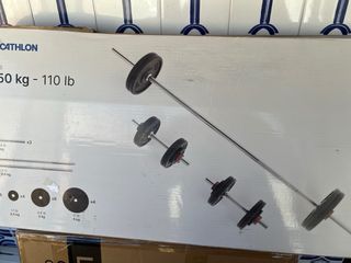 Banco de pesas Domyos + Barra y discos