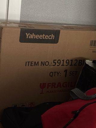 Jaula para ninfas con ruedas en su caja sin abrir