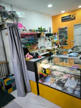 Traspaso de tienda de arreglos de ropa