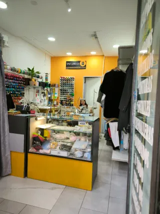 Traspaso de tienda de arreglos de ropa