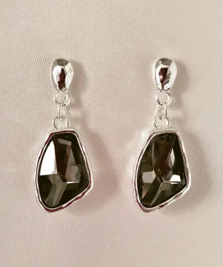 Pendientes estilo Uno de 50.