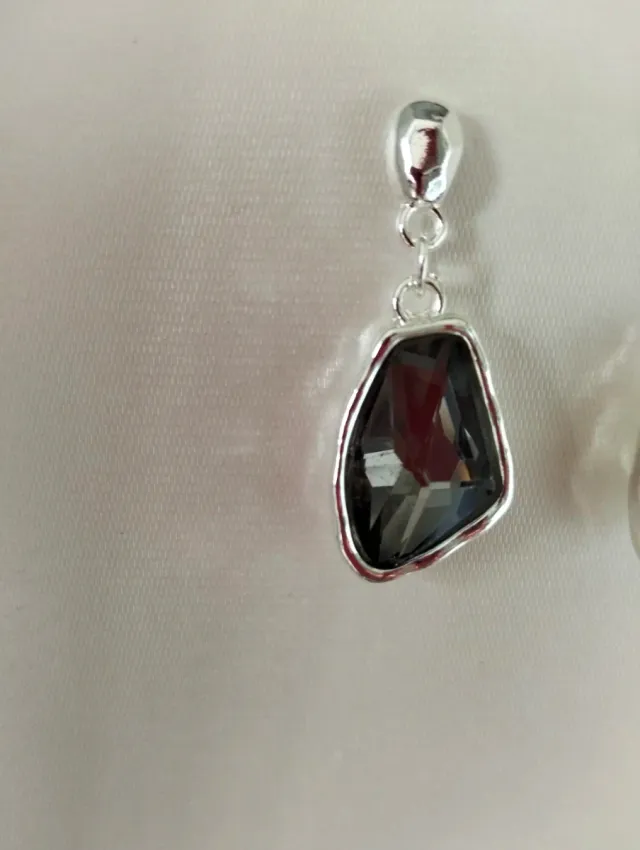 Pendientes estilo Uno de 50.