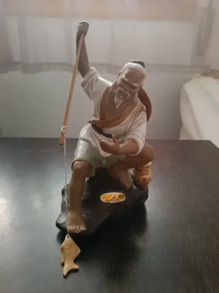 Figura cerámica pescador chino