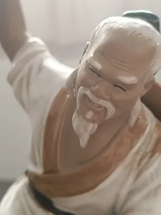 Figura cerámica pescador chino