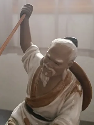 Figura cerámica pescador chino