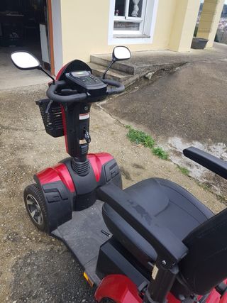 Silla motorizada scooter roja y negra