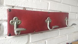 Antiguo perchero pared .