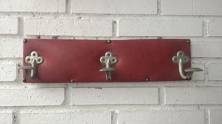 Antiguo perchero pared .