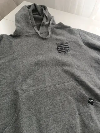 Sudadera gris con escudo Lehengokoak