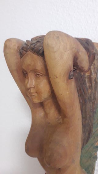 Mascarón de proa de madera