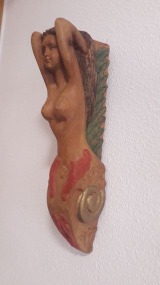 Mascarón de proa de madera