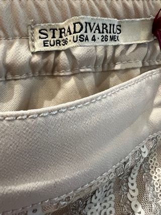 Falda corta lentejuelas doradas y plateadas