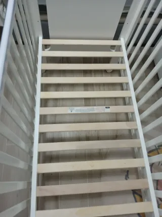 Cuna blanca con osito