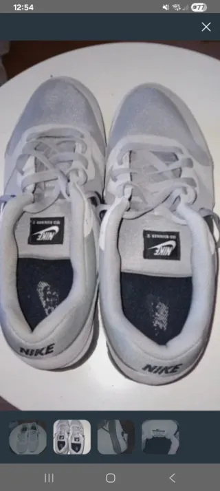 Tenis Nike grises y blancos