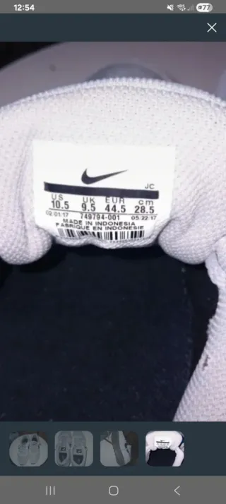 Tenis Nike grises y blancos