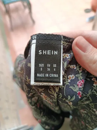 Falda corta floral negra - talla S