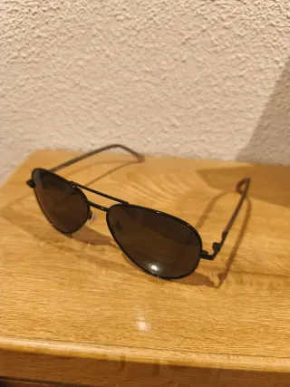 Gafas de sol Polaroid Aviador Negro.