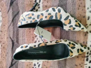 Zapatos tacón estampado animal print