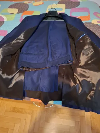 Traje azul chaqueta y pantalón