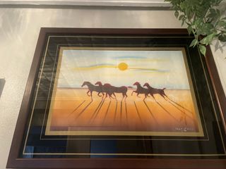 Cuadro de caballos al atardecer