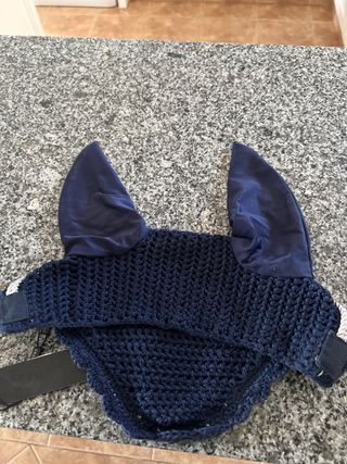 Mosquero orejero azul marino