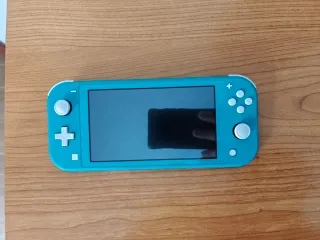 Nintendo Switch Lite + Accesorios. Como nueva.