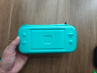 Nintendo Switch Lite + Accesorios. Como nueva.