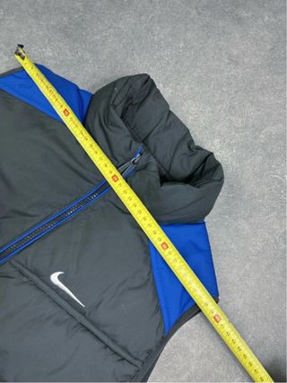 Chaleco acolchado Nike unisex gris y azul