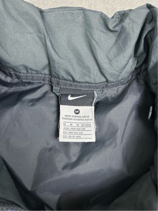 Chaleco acolchado Nike unisex gris y azul