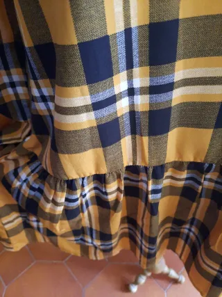 Vestito a quadri con fondo a voilan