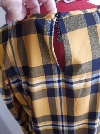 Vestito a quadri con fondo a voilan