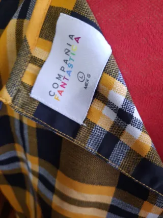 Vestito a quadri con fondo a voilan