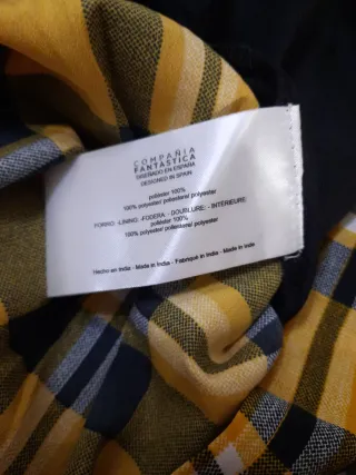 Vestito a quadri con fondo a voilan