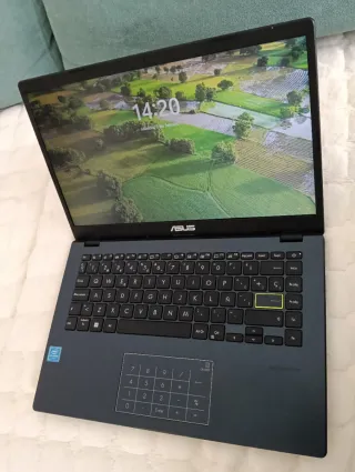 Ordenador portátil Asus con cargador lila/azul