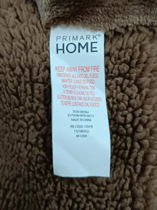 Bata manta con capucha de mono