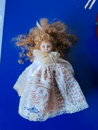 Mini carrozzina vintage con bambola