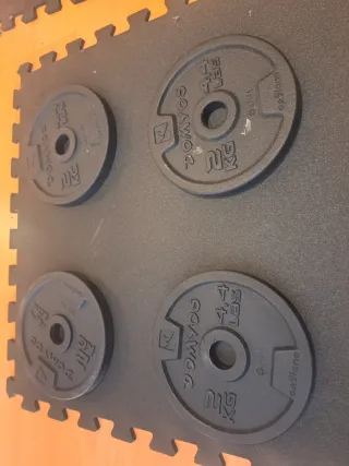 4 discos pesas 2kg Decathlon.