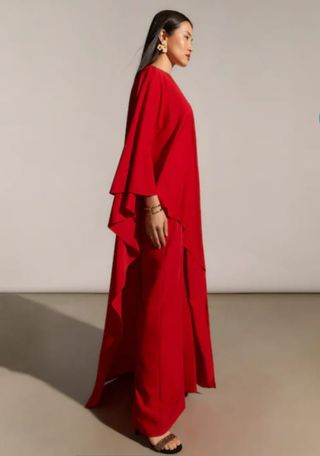 Mono fiesta capa asimétrica rojo