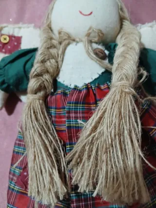 Bambola vintage in pezza con dettagli in spago