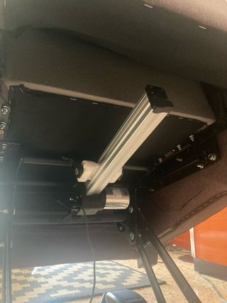 Sillón eléctrico de tela gris