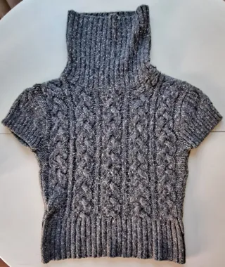 Jersey Trucco cuello vuelto trenzado gris