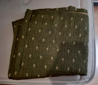 Colcha individual verde con estampado